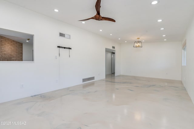 empty room featuring ceiling fan