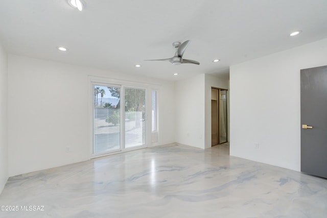 unfurnished room with ceiling fan