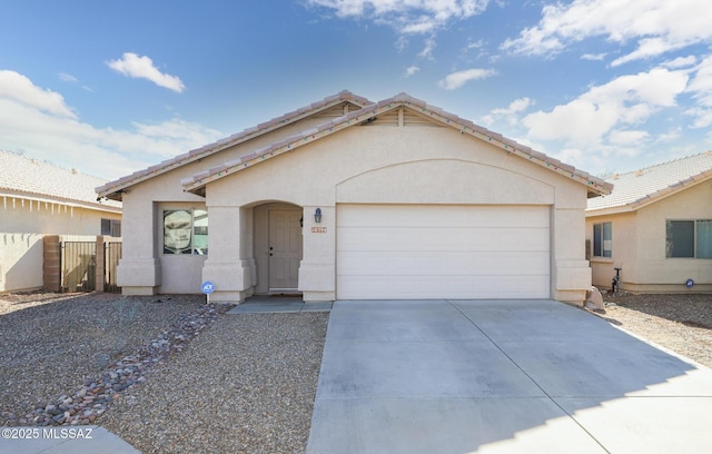 single story home with a garage