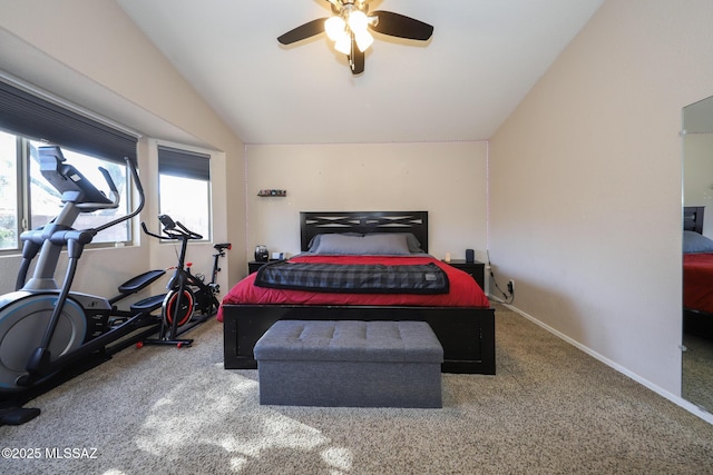 bedroom with carpet flooring, ceiling fan, and vaulted ceiling