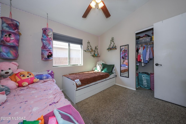 bedroom with carpet flooring, ceiling fan, lofted ceiling, and a closet