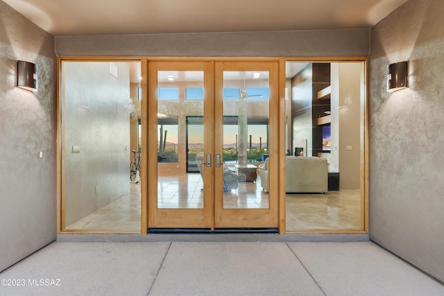 exterior entry at dusk with french doors