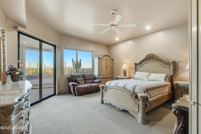 carpeted bedroom featuring access to exterior and ceiling fan