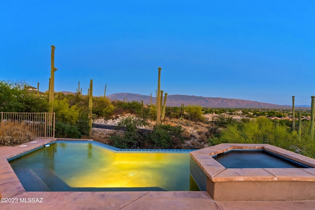 view of pool with a mountain view