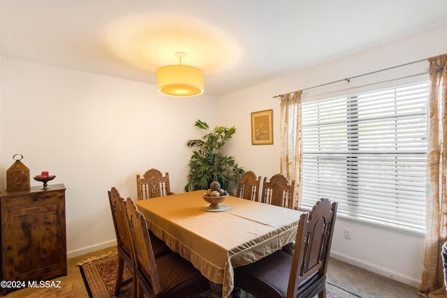 dining area with carpet floors