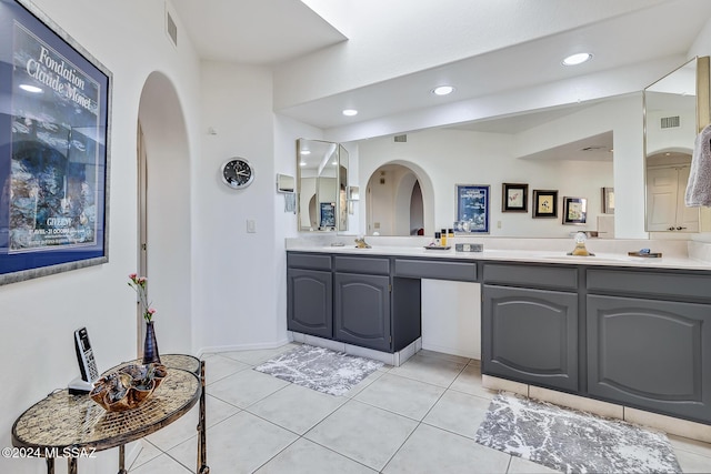 bathroom with vanity and tile patterned flooring