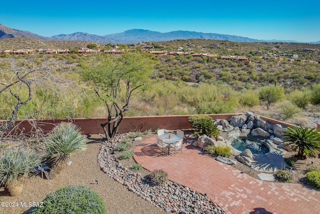 bird's eye view with a mountain view