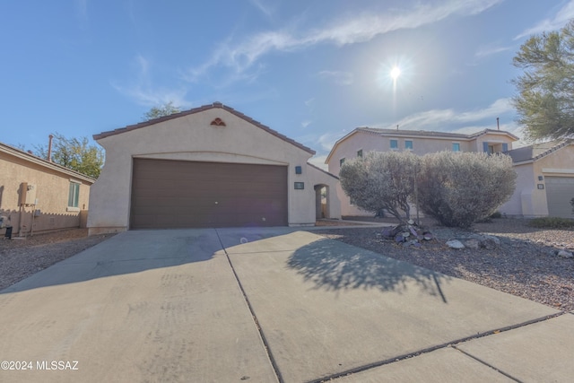 view of front of home featuring a garage