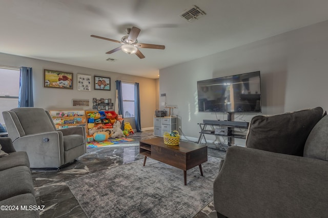 living room featuring ceiling fan