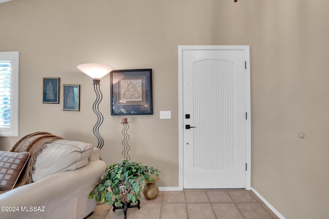 entryway featuring light tile patterned floors