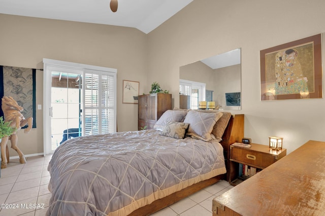 bedroom with ceiling fan, light tile patterned floors, access to outside, and vaulted ceiling