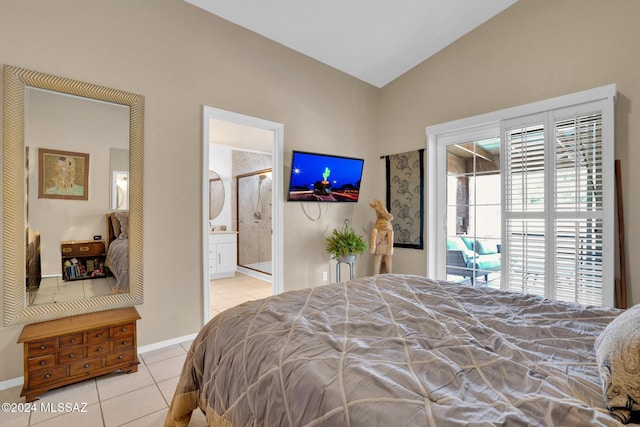 bedroom with ensuite bathroom, light tile patterned flooring, access to outside, and vaulted ceiling