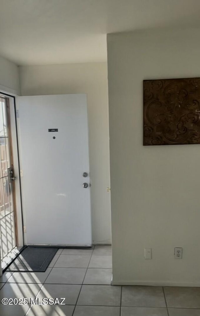 interior space featuring light tile patterned flooring