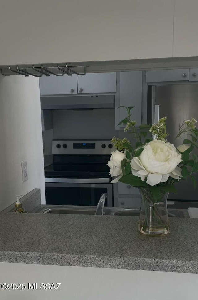 kitchen with stainless steel electric stove