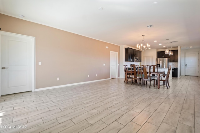 dining room featuring an inviting chandelier