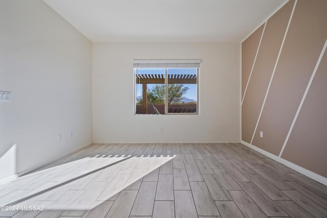 empty room featuring light wood-type flooring