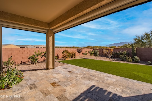 view of patio with a mountain view