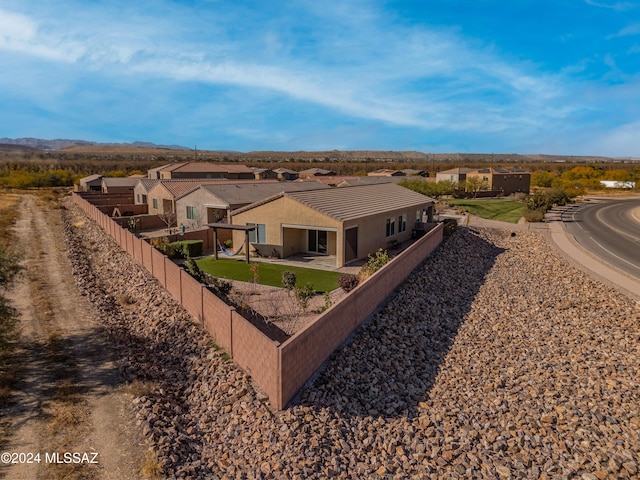 birds eye view of property with a residential view