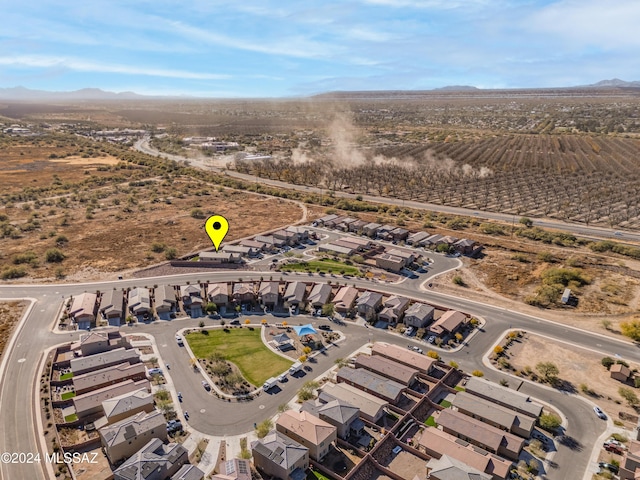drone / aerial view with a mountain view and a residential view
