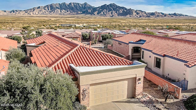 bird's eye view with a mountain view