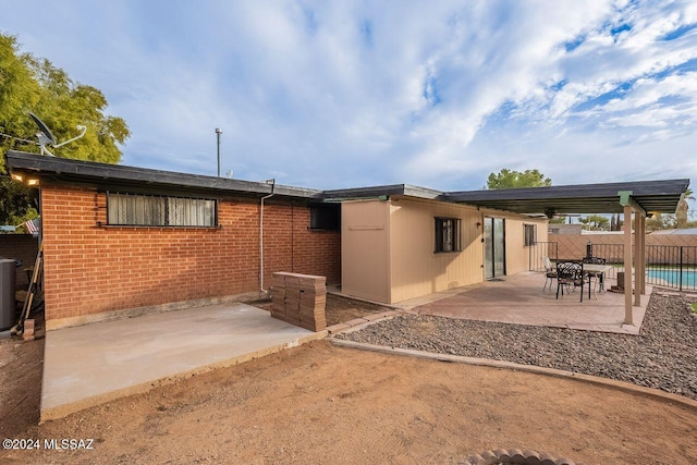 rear view of property with a patio