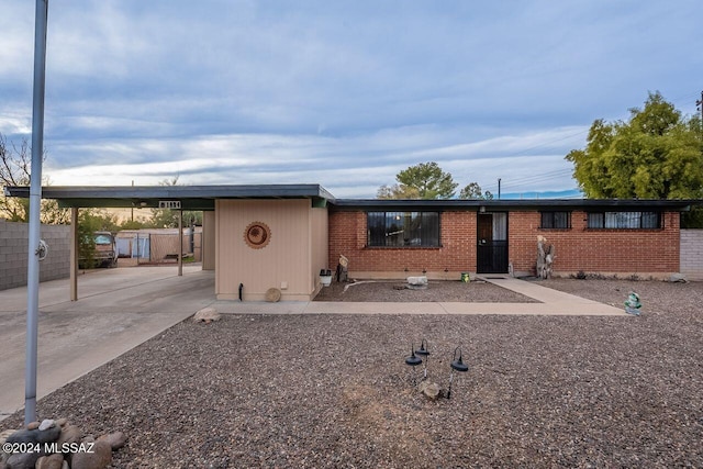 view of front of house featuring a carport