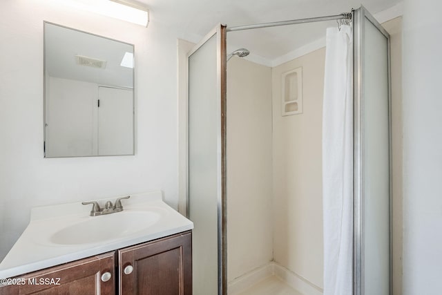 bathroom featuring vanity and curtained shower