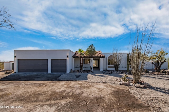 view of front of property featuring a garage