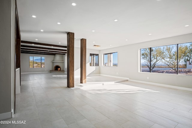 basement with a large fireplace