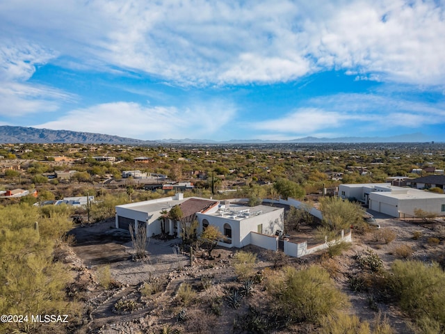 drone / aerial view featuring a mountain view