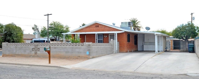 view of front facade with a carport