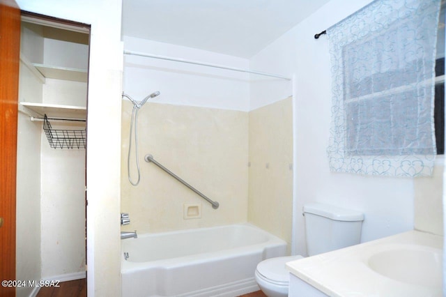 full bathroom with vanity, shower / bathtub combination, toilet, and wood-type flooring