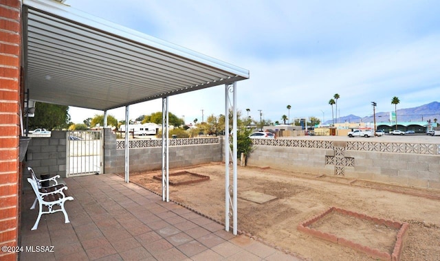 view of patio featuring a mountain view