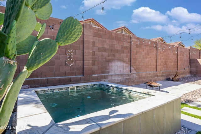 view of pool featuring fence private yard