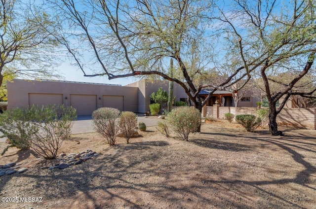 adobe home with a garage