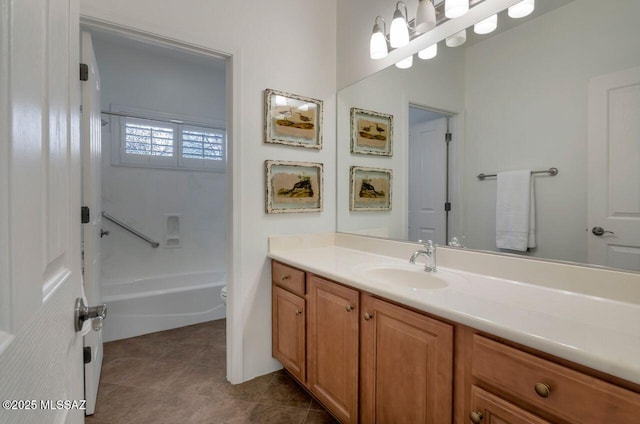 bathroom with vanity, toilet, and tile patterned flooring