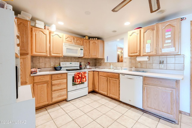 kitchen featuring light tile patterned floors, white appliances, ceiling fan, and backsplash