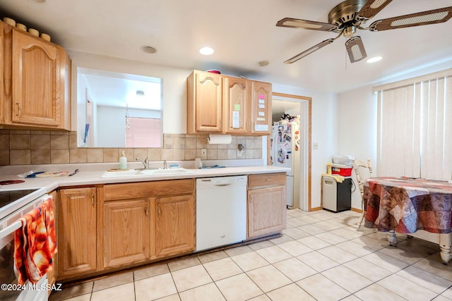 kitchen with backsplash, ceiling fan, sink, and white appliances