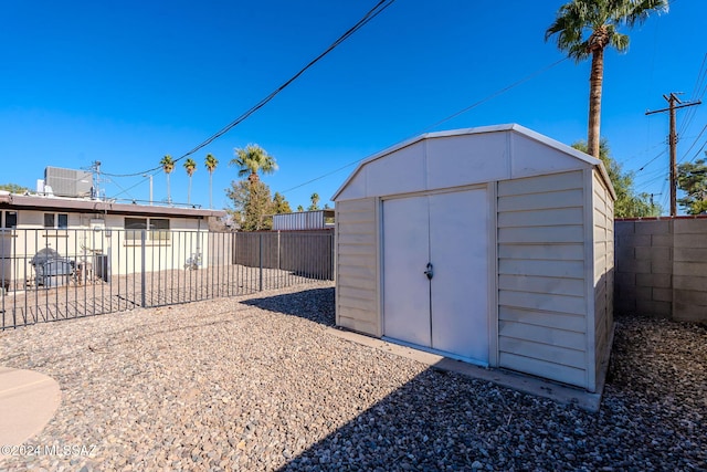 view of outbuilding featuring cooling unit