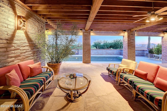 view of patio featuring outdoor lounge area and ceiling fan