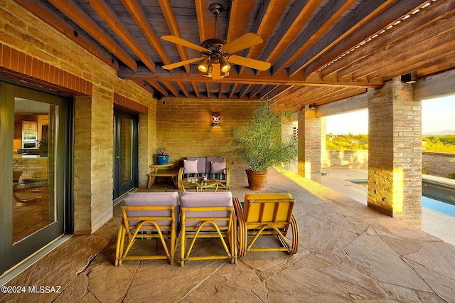 view of patio / terrace featuring ceiling fan