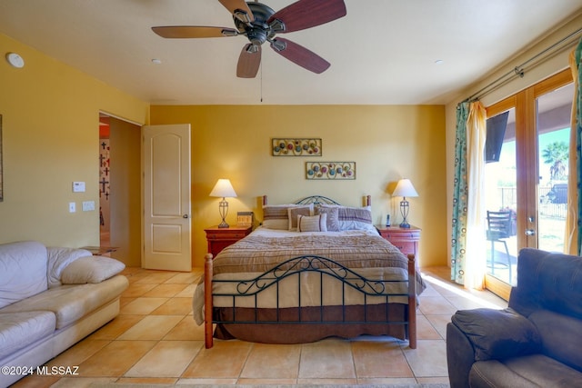 bedroom featuring ceiling fan, access to exterior, light tile patterned floors, and french doors