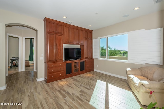 living room with light hardwood / wood-style flooring