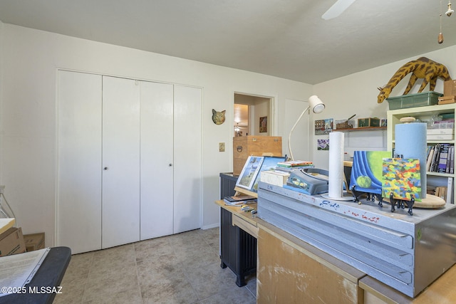 tiled office with ceiling fan