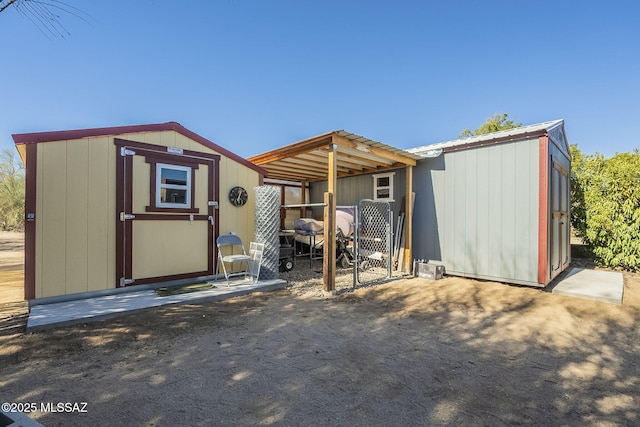 exterior space featuring a storage unit