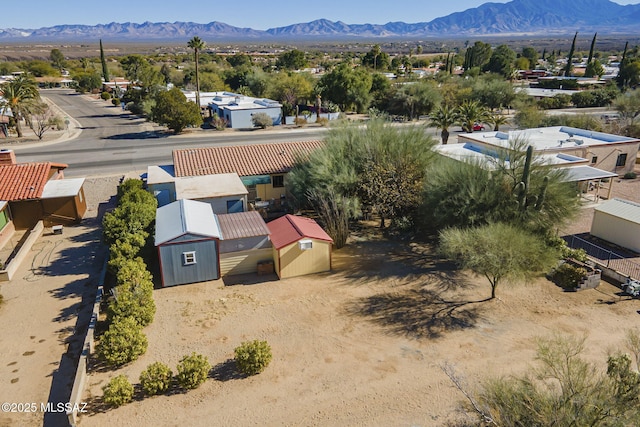 drone / aerial view featuring a mountain view