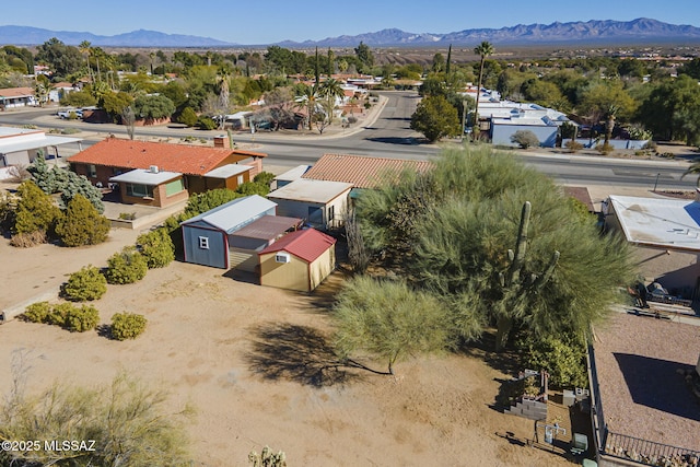 drone / aerial view featuring a mountain view