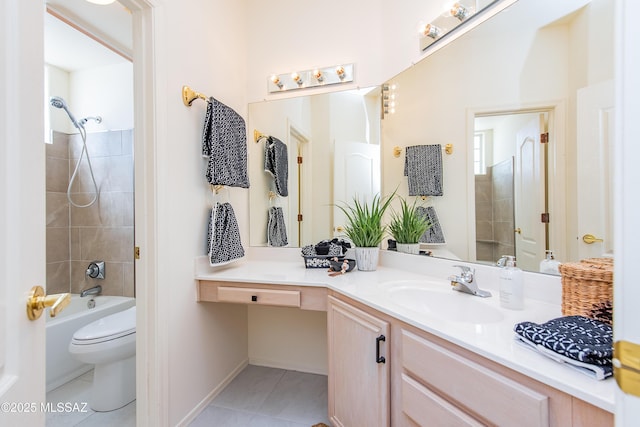 bathroom featuring baseboards, toilet, tile patterned flooring, tub / shower combination, and vanity