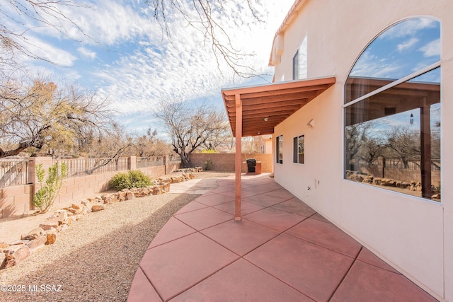 view of patio featuring a fenced backyard