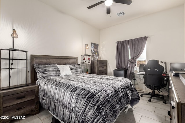 bedroom featuring ceiling fan and light tile patterned flooring